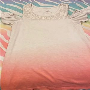 I’m selling a cut off shoulder kid t shirt